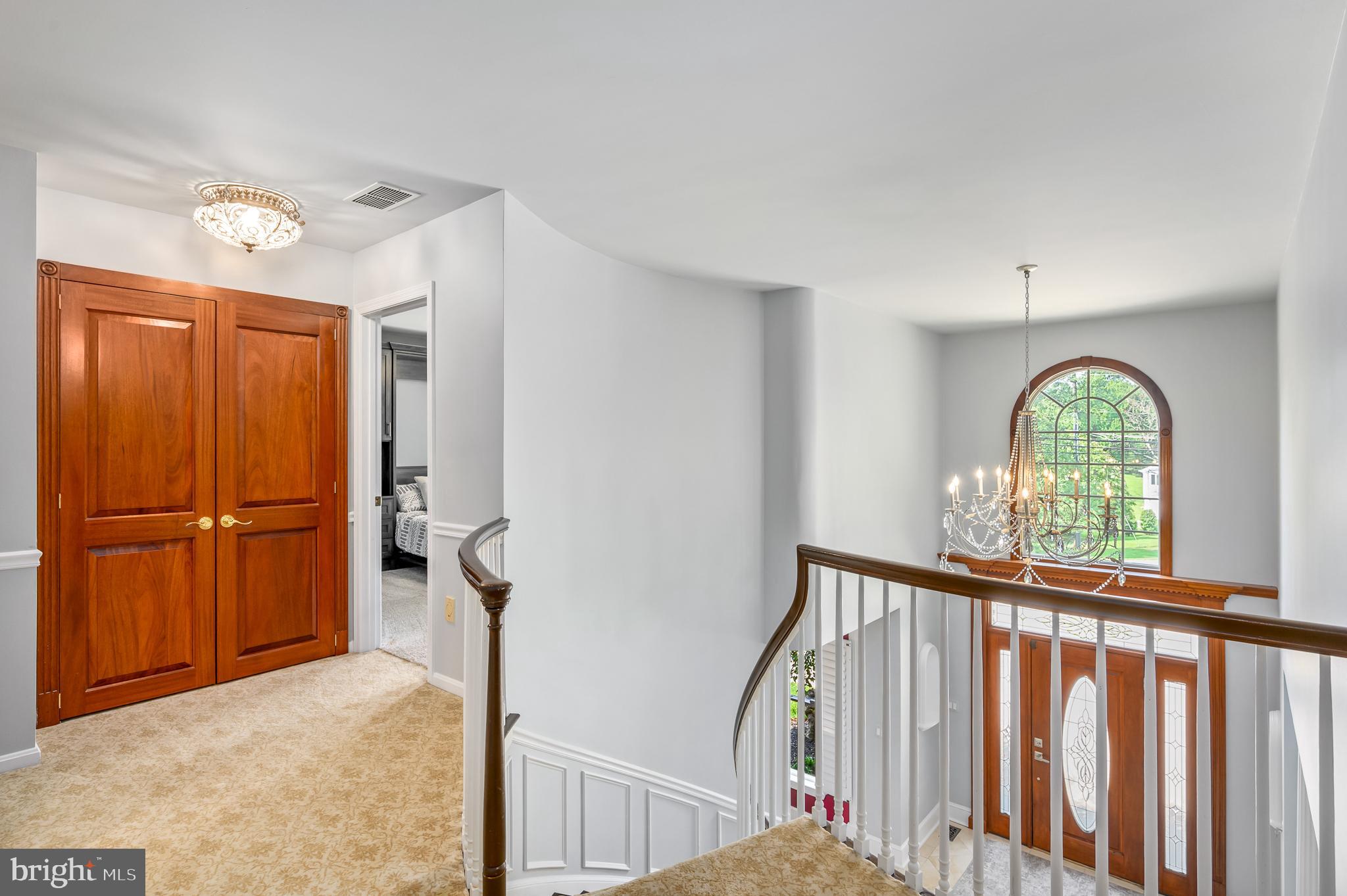 337 River Bend Road Great Falls, VA 22066 - Photo 39 of 92 Upper level landing and hall