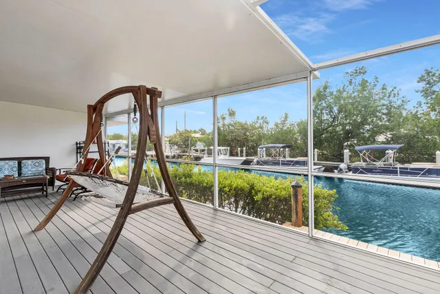 a view of swimming pool with a lounge chair