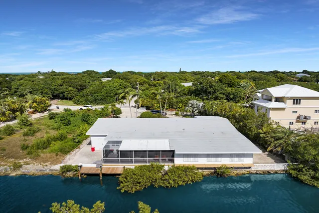a view of a swimming pool with a lake view