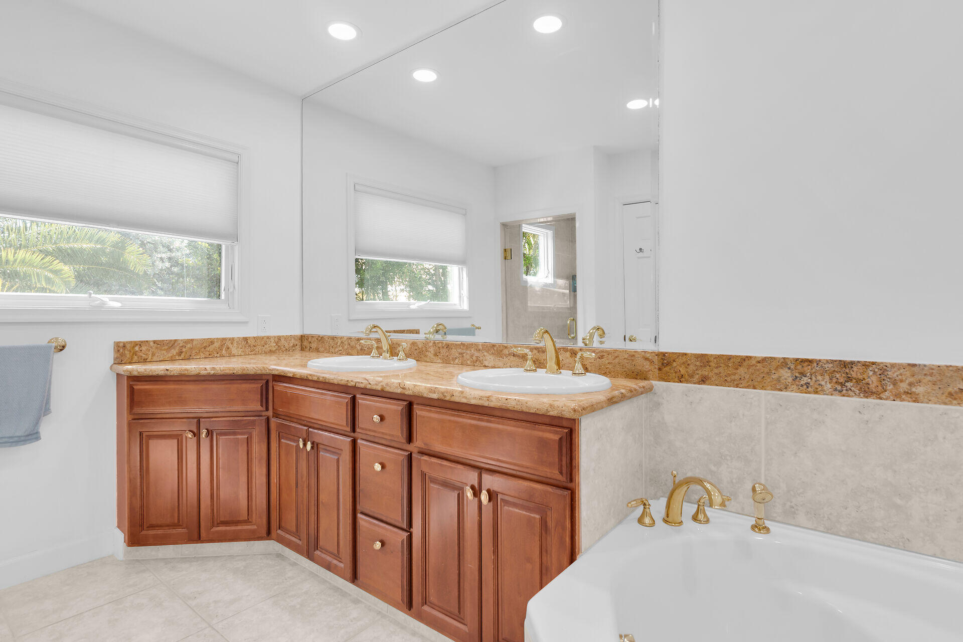 7501 Gulfstream Boulevard Marathon, FL 33050 - Photo 44 of 48 a bathroom with a tub sink and mirror