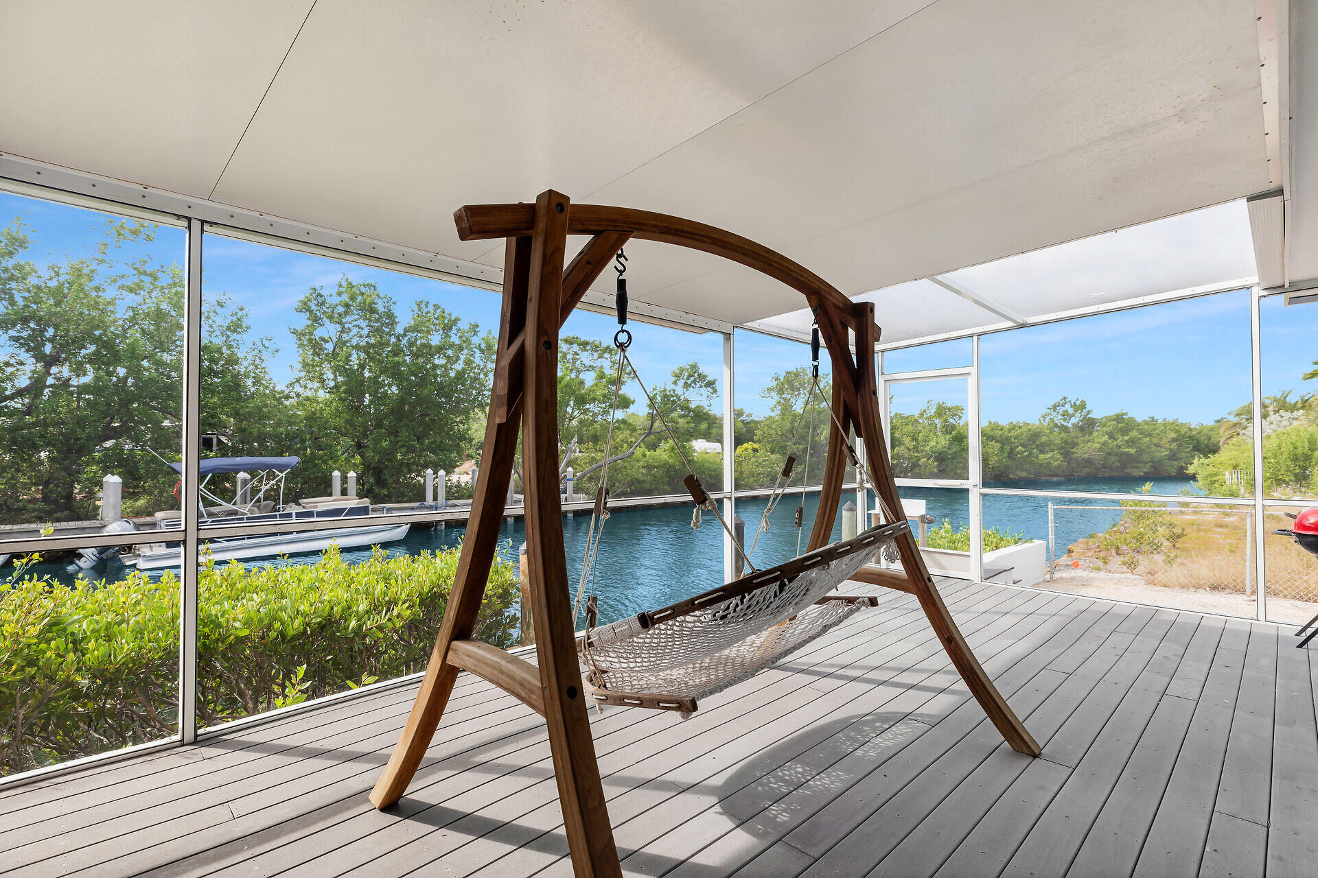 7501 Gulfstream Boulevard Marathon, FL 33050 - Photo 8 of 48 a view of a balcony with lake view and wooden floor