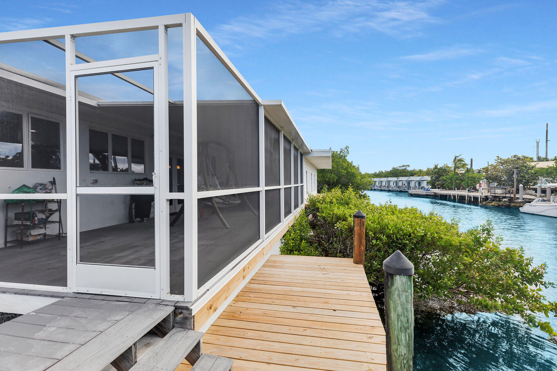 7501 Gulfstream Boulevard Marathon, FL 33050 - Photo 10 of 48 Screened Porch & Dock