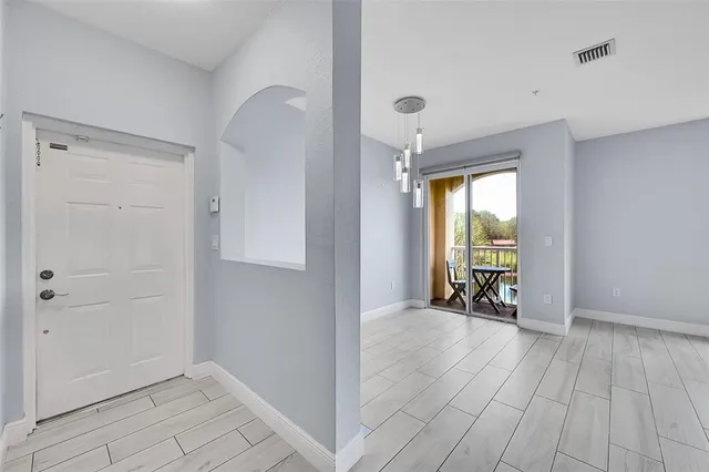 wooden floor and chair in a room