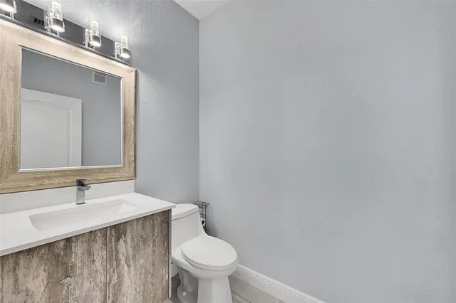 a bathroom with a sink and a toilet