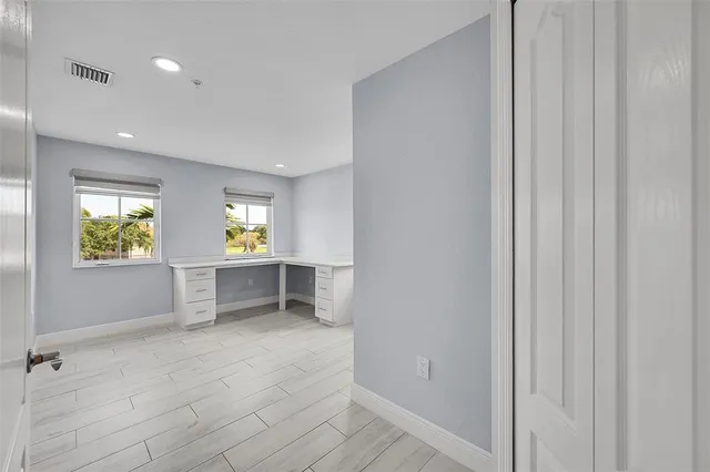 a view of room with window and walk in closet