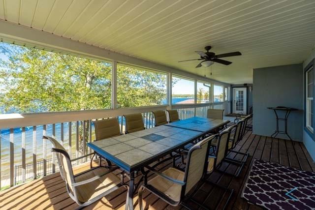 6209 Point La Vista Road Malakoff, TX 75148 - Photo 13 of 38 a view of a dining room with furniture window and wooden floor