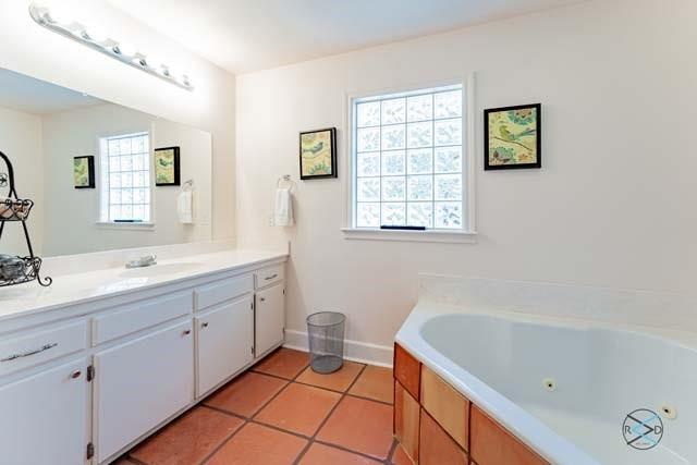 6209 Point La Vista Road Malakoff, TX 75148 - Photo 16 of 38 a spacious bathroom with a tub sink and mirror
