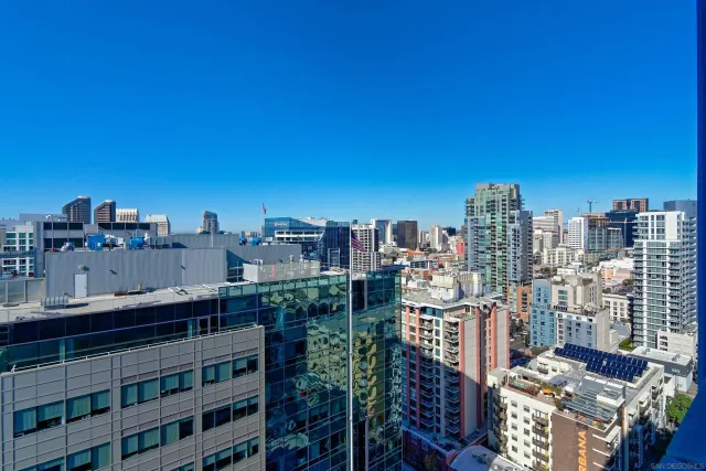 a view of a hallway with a chandelier