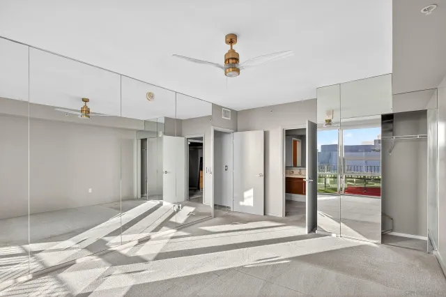 a view of a city with lawn chairs