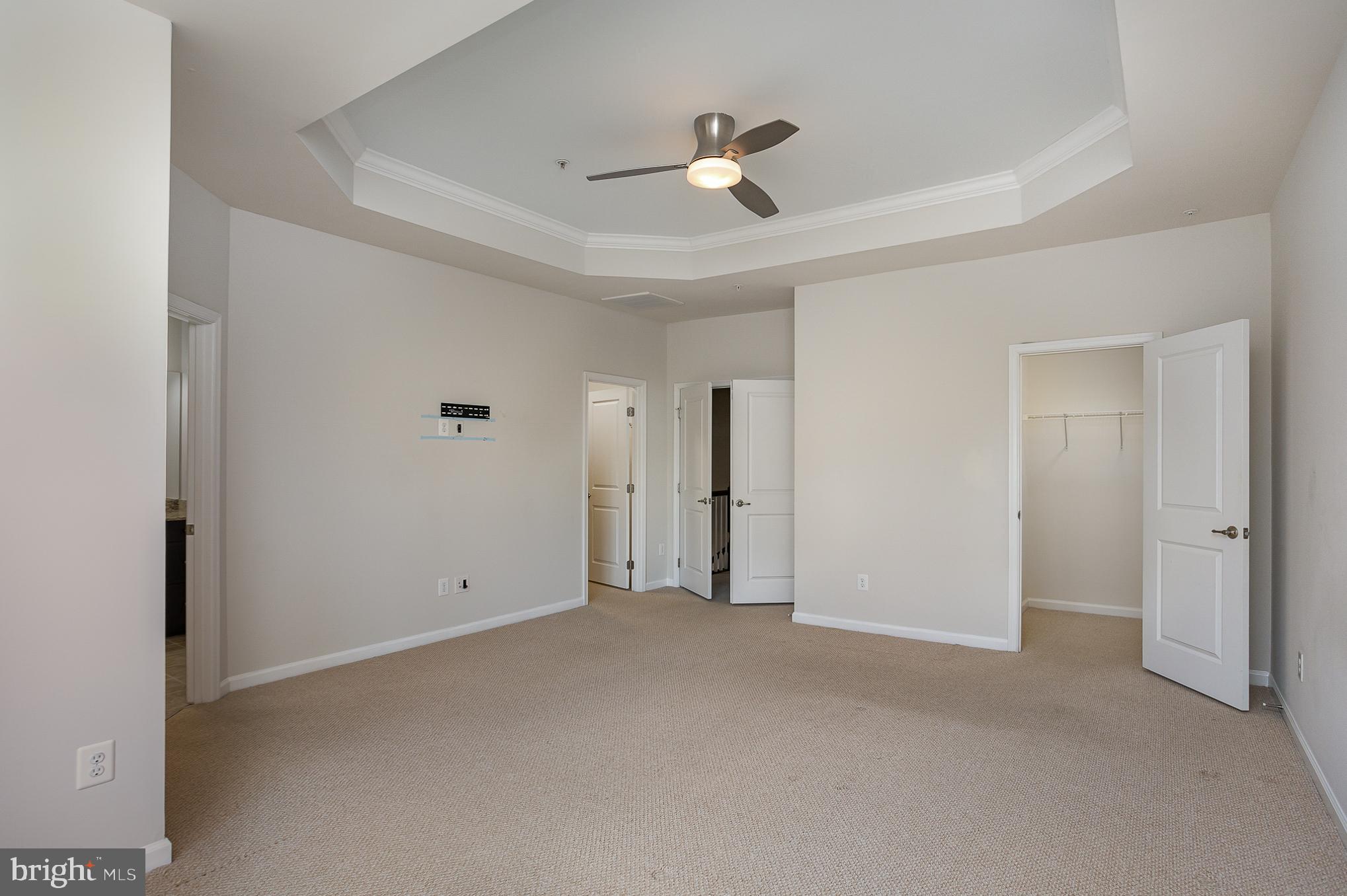 25890 Racing Sun Drive Aldie, VA 20105 - Photo 12 of 25 a view of an empty room with a ceiling fan