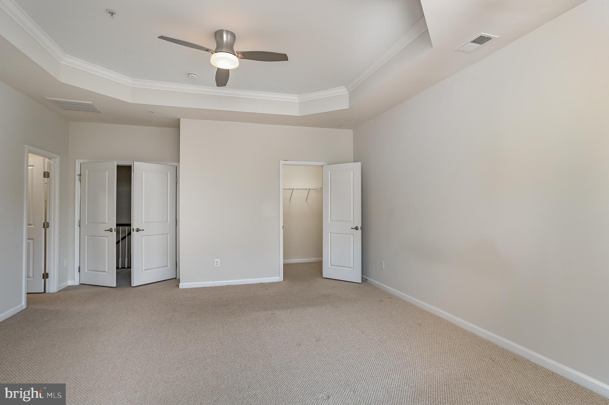 25890 Racing Sun Drive Aldie, VA 20105 - Photo 15 of 25 a view of an empty room and a ceiling fan
