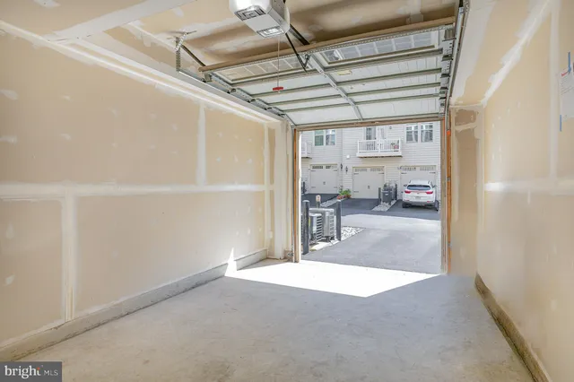 a close view of utility room with washer and dryer