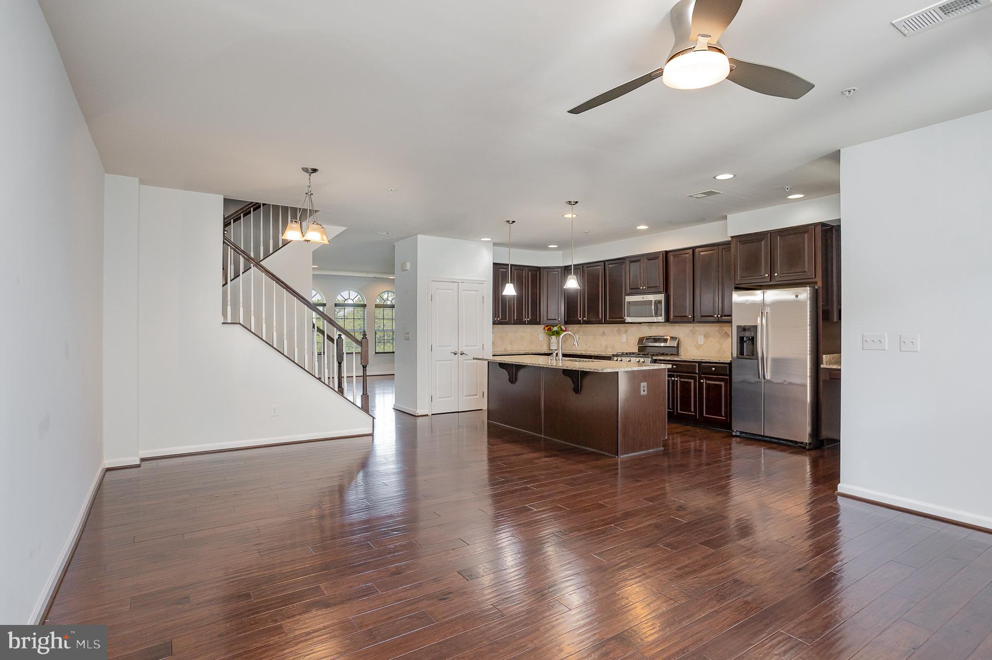 25890 Racing Sun Drive Aldie, VA 20105 - Photo 4 of 25 a view of kitchen with cabinets and wooden floor