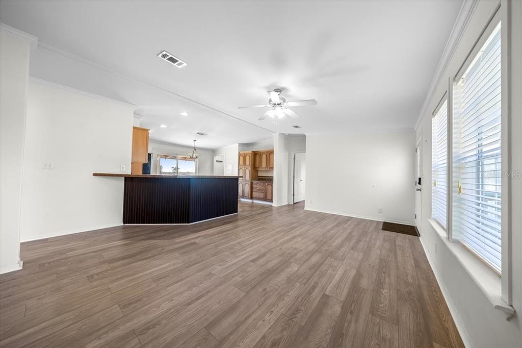 17355 Southeast 260th Avenue Road Umatilla, FL 32784 - Photo 18 of 69 a view of a kitchen with a sink and a window