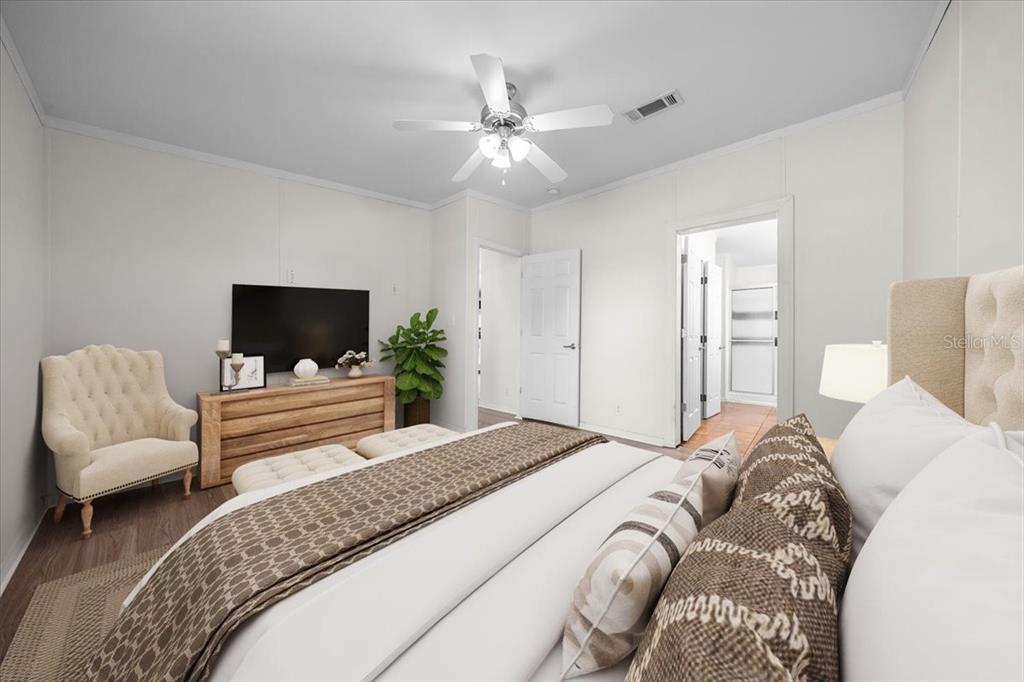 17355 Southeast 260th Avenue Road Umatilla, FL 32784 - Photo 20 of 69 a bedroom with a bed and a couch