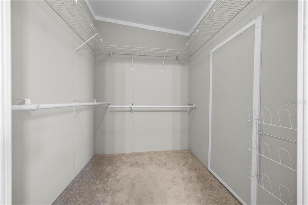 17355 Southeast 260th Avenue Road Umatilla, FL 32784 - Photo 22 of 69 a view of an empty walk in closet