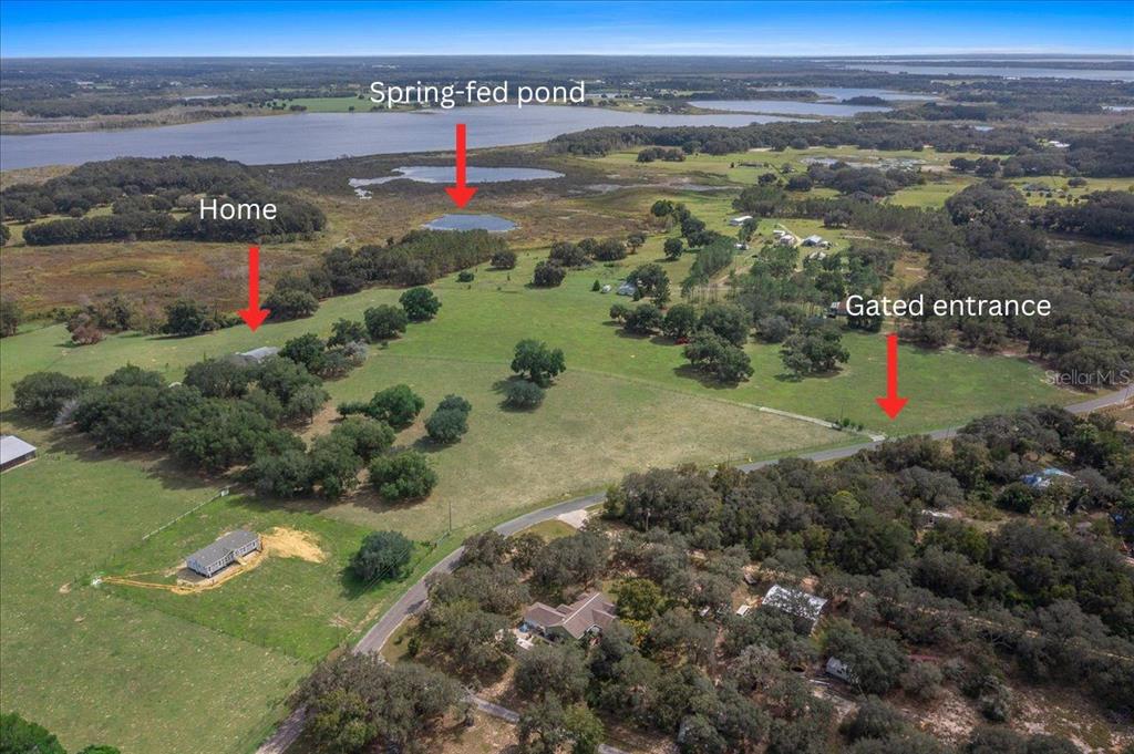 17355 Southeast 260th Avenue Road Umatilla, FL 32784 - Photo 3 of 69 a view of a lake with a mountain