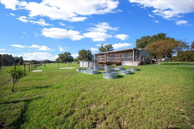 a view of a lake with a yard
