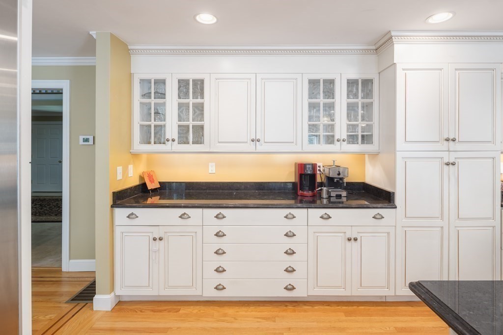 29 Anne Road North Andover, MA 01845 - Photo 13 of 31 a kitchen with granite countertop a sink and a stove