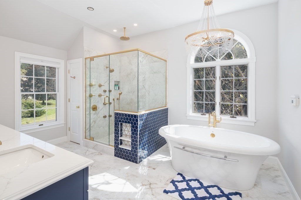 29 Anne Road North Andover, MA 01845 - Photo 17 of 31 a bathroom with a sink a toilet and shower