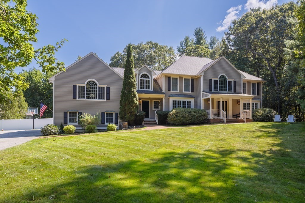 29 Anne Road North Andover, MA 01845 - Photo 2 of 31 a front view of a house with a garden