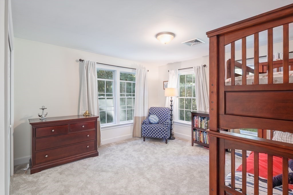 29 Anne Road North Andover, MA 01845 - Photo 23 of 31 a living room with furniture and a floor to ceiling window