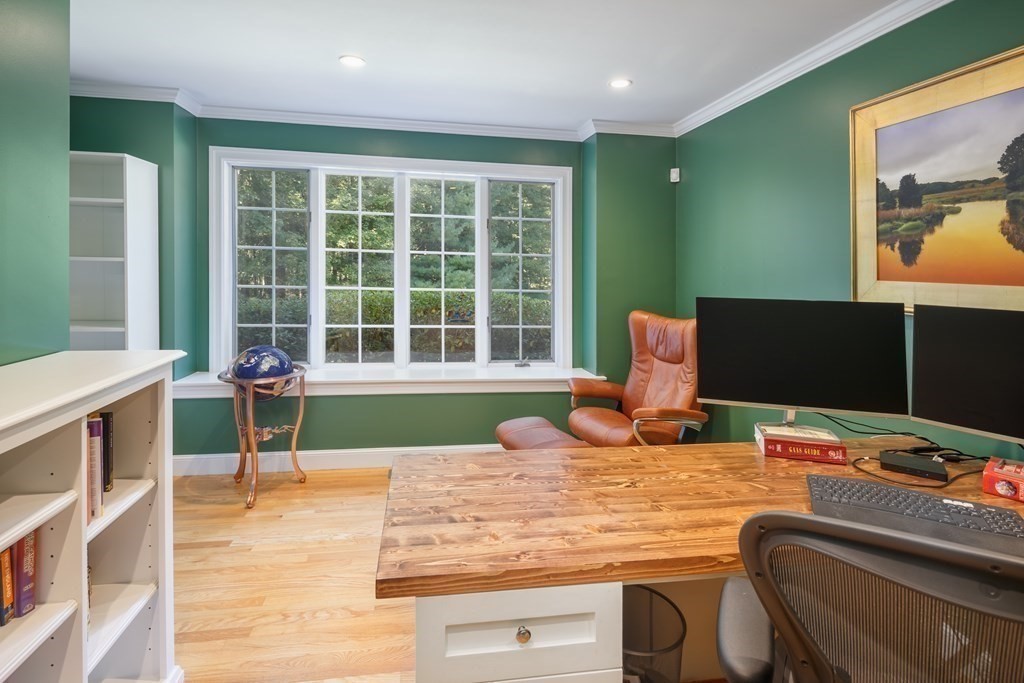 29 Anne Road North Andover, MA 01845 - Photo 24 of 31 a living room with furniture and a flat screen tv