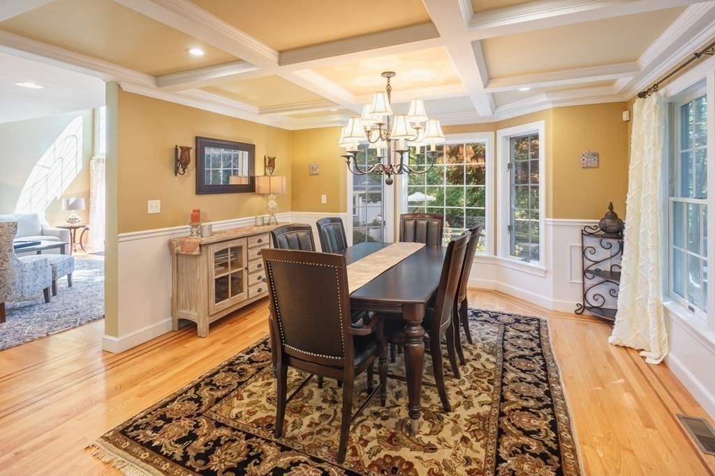 29 Anne Road North Andover, MA 01845 - Photo 8 of 31 a view of a dining room with furniture wooden floor and chandelier
