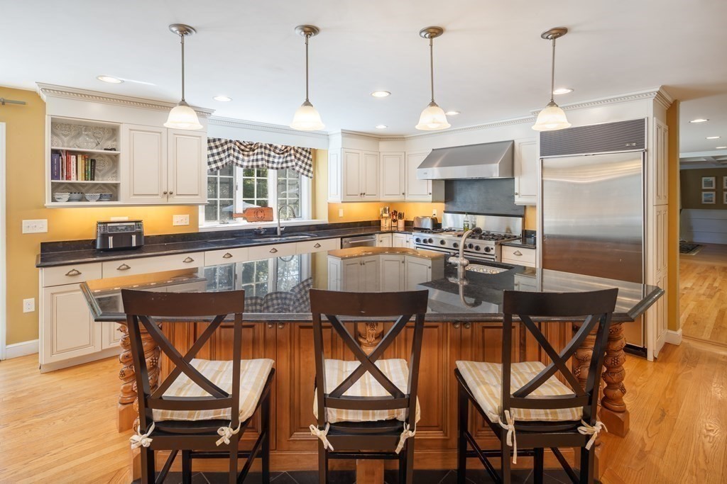 29 Anne Road North Andover, MA 01845 - Photo 10 of 31 a view of a dining room with furniture window and wooden floor