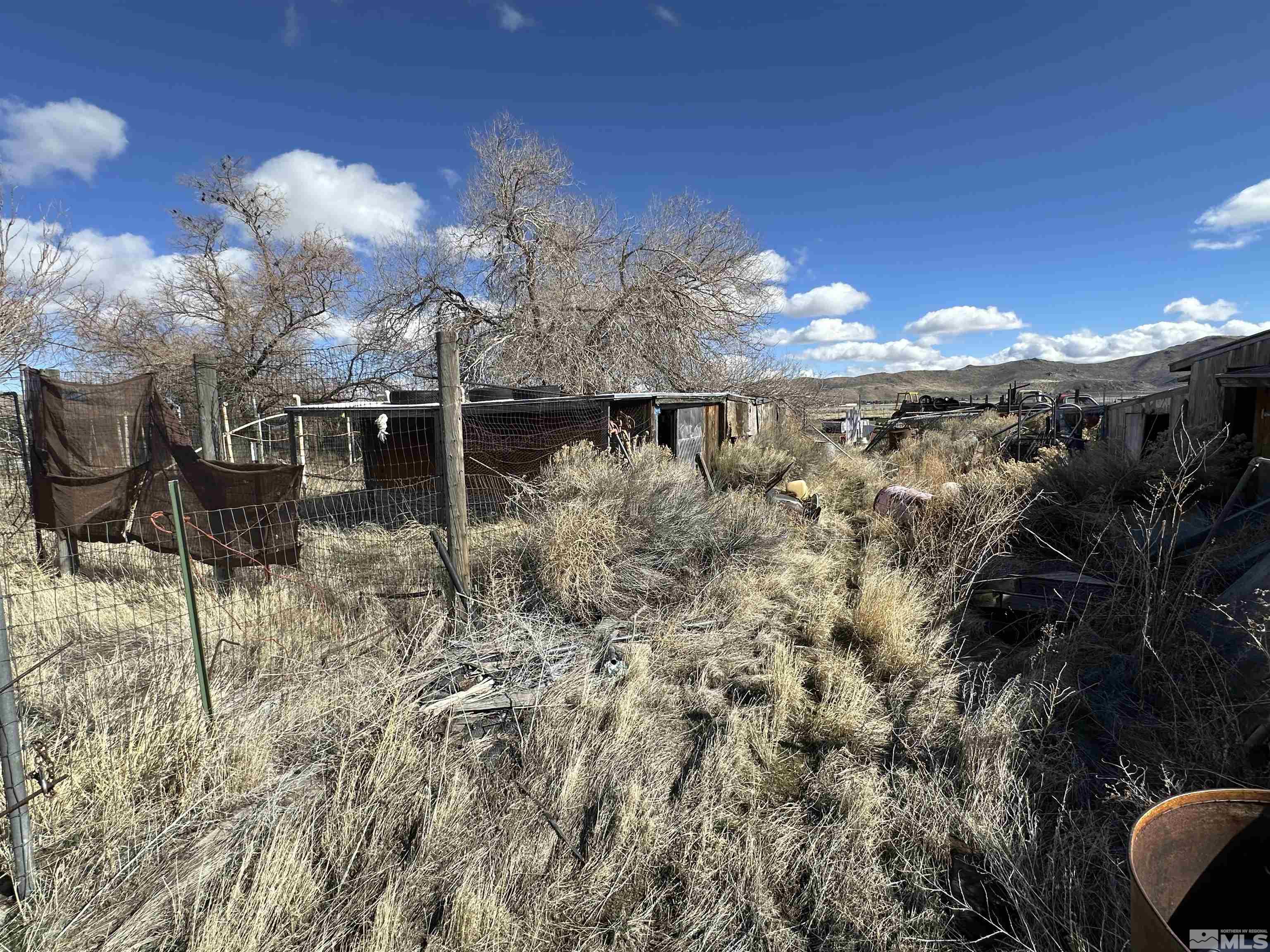 17605 West Aspen Circle Reno, NV 89508 - Photo 11 of 19 a view of a house with a yard