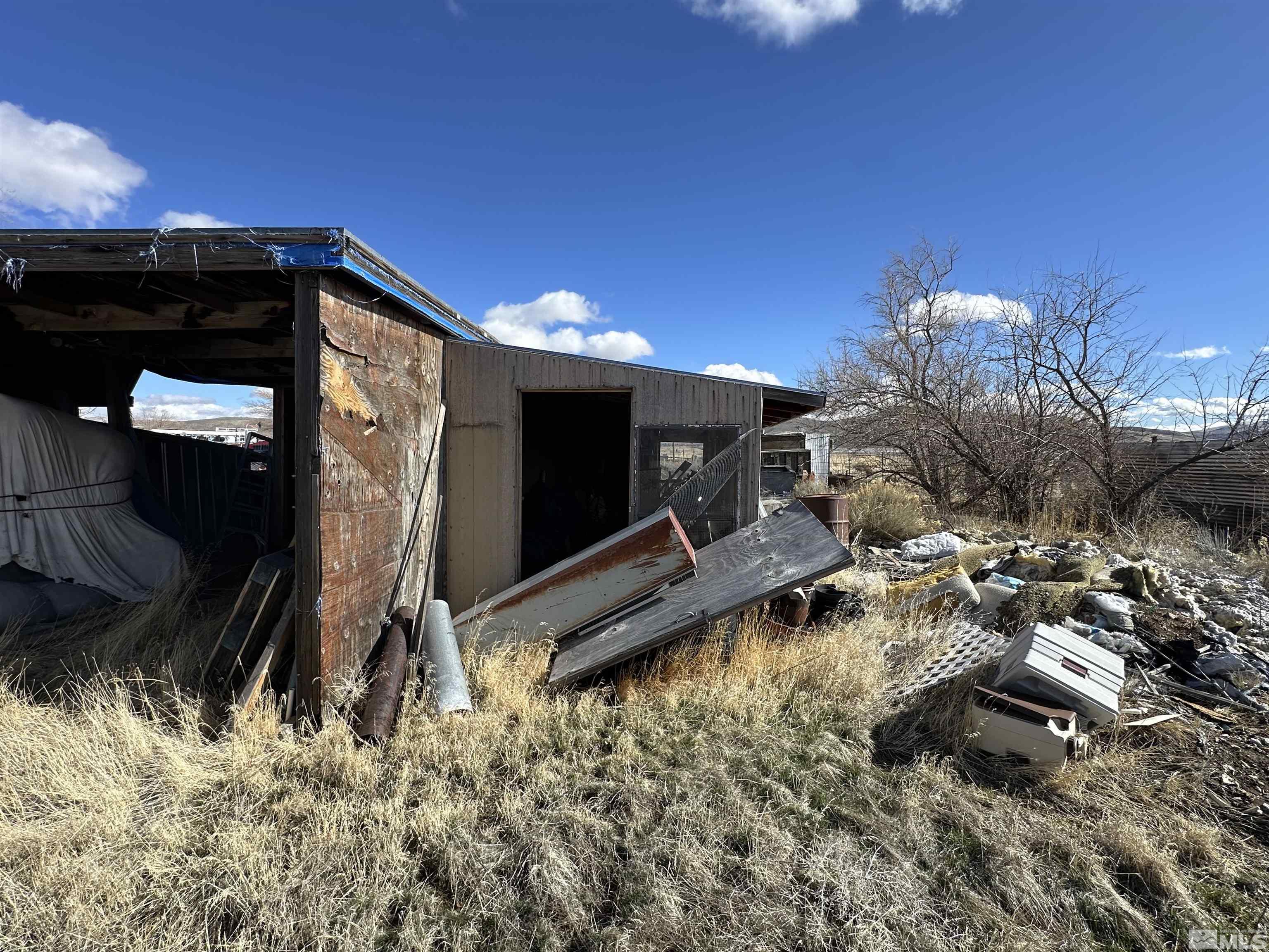17605 West Aspen Circle Reno, NV 89508 - Photo 14 of 19 a backyard of a house with table and chairs