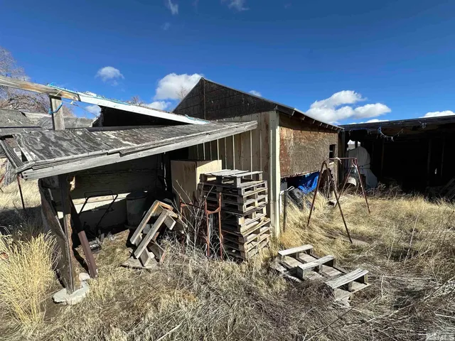 a view of a backyard of a house