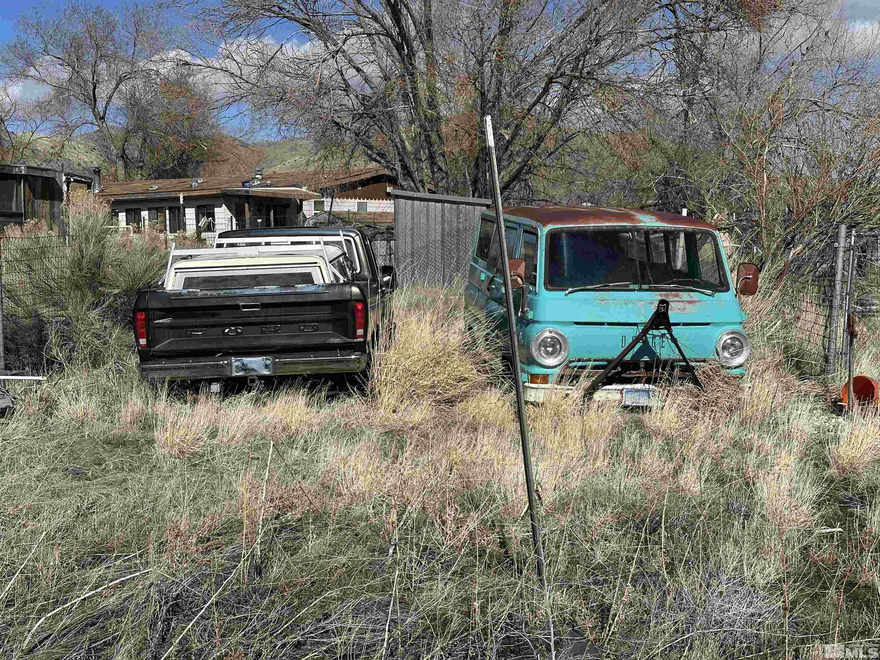 17605 West Aspen Circle Reno, NV 89508 - Photo 19 of 19 a front view of a house with a yard