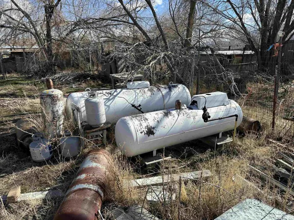 a view of a backyard with furniture and snow
