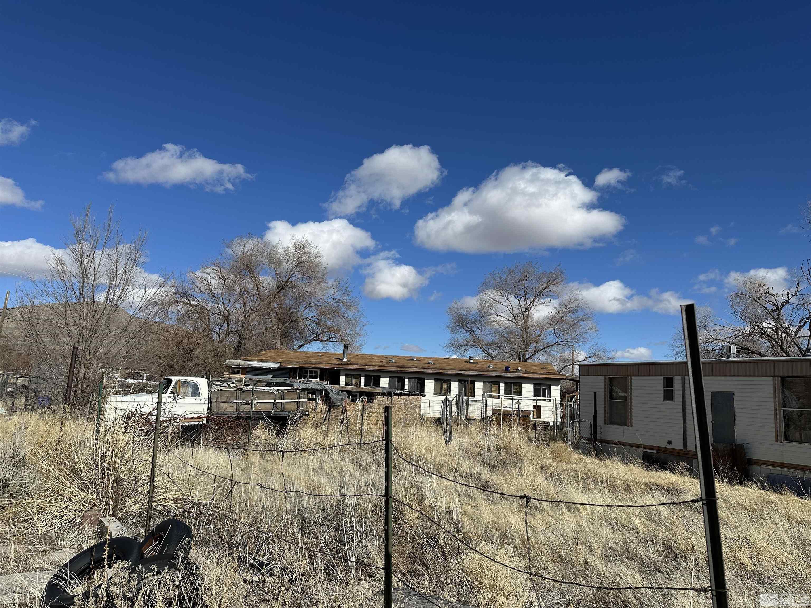 17605 West Aspen Circle Reno, NV 89508 - Photo 6 of 19 a view of a swimming pool with a table and chairs