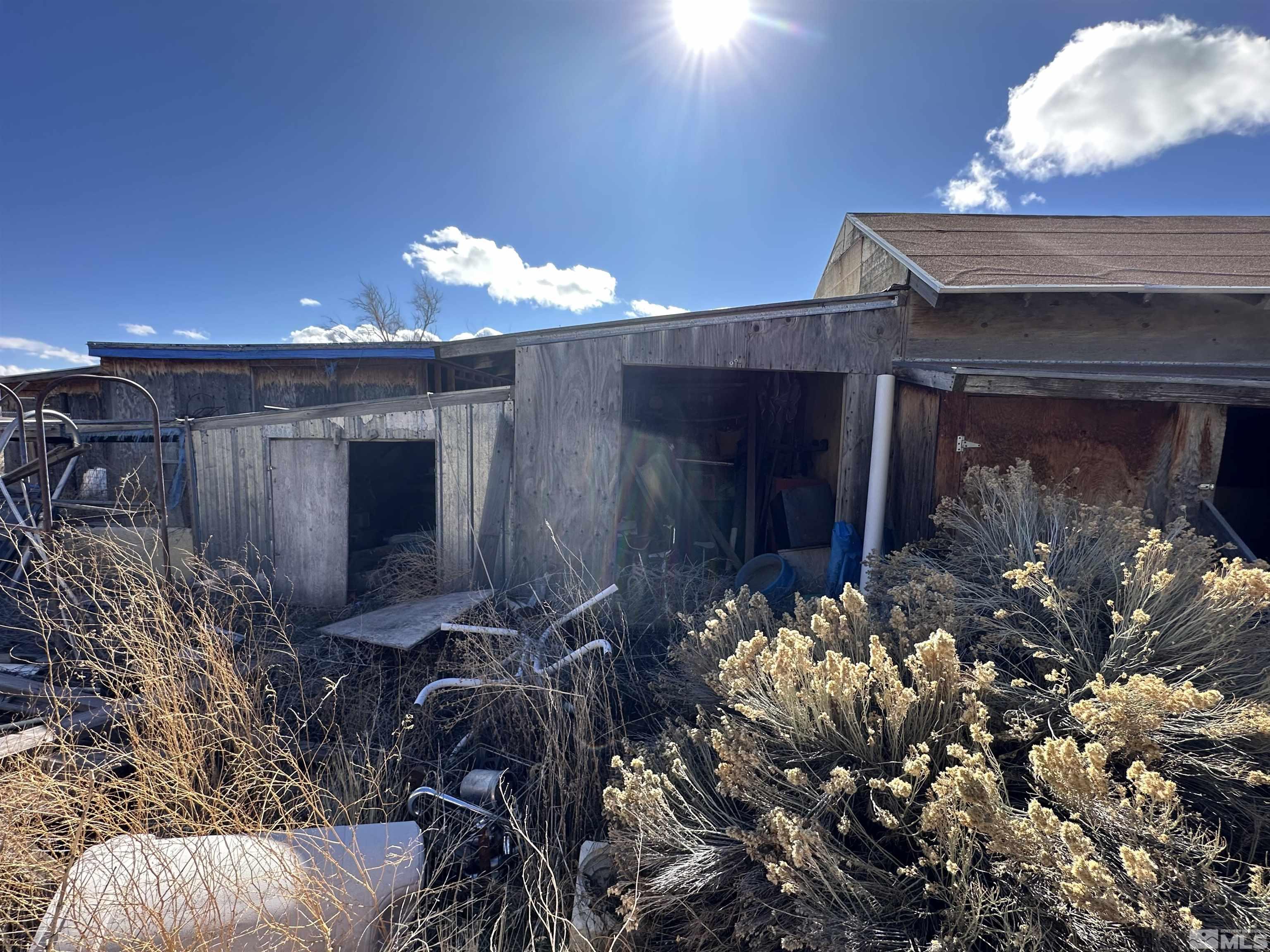 17605 West Aspen Circle Reno, NV 89508 - Photo 10 of 19 a room with water heater and wooden walls