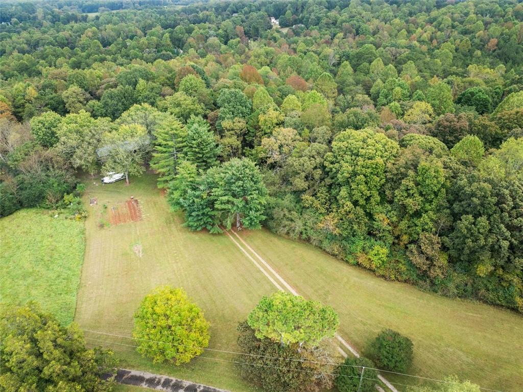 6668 Belton Bridge Road Lula, GA 30554 - Photo 15 of 20 a view of a yard