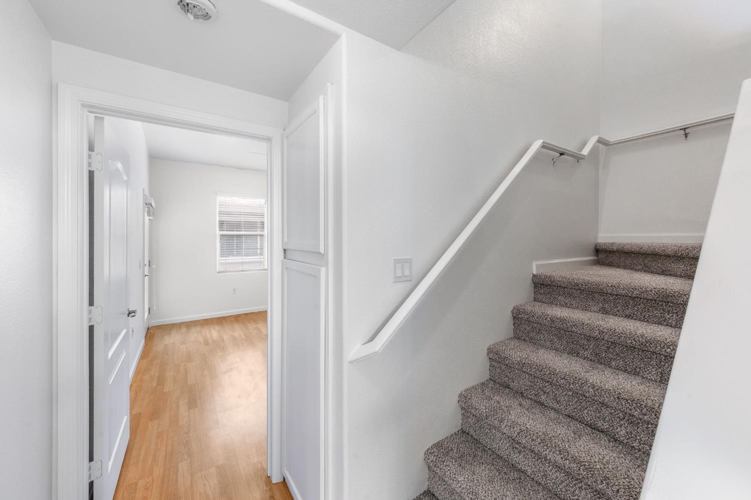 1900 Danbrook Drive, Unit 1222 Sacramento, CA 95835 - Photo 22 of 51 a view of entryway with wooden floor and stairs