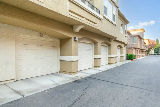 a view of a water fountain in front of the house