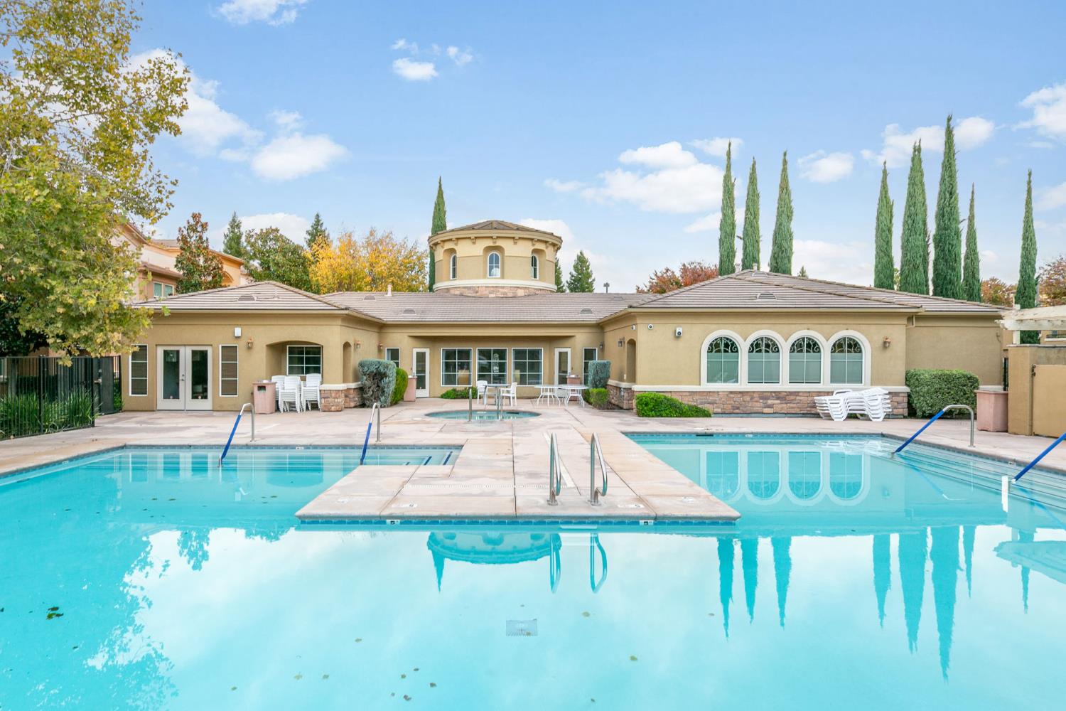 1900 Danbrook Drive, Unit 1222 Sacramento, CA 95835 - Photo 50 of 51 a front view of a house with a yard table and chairs