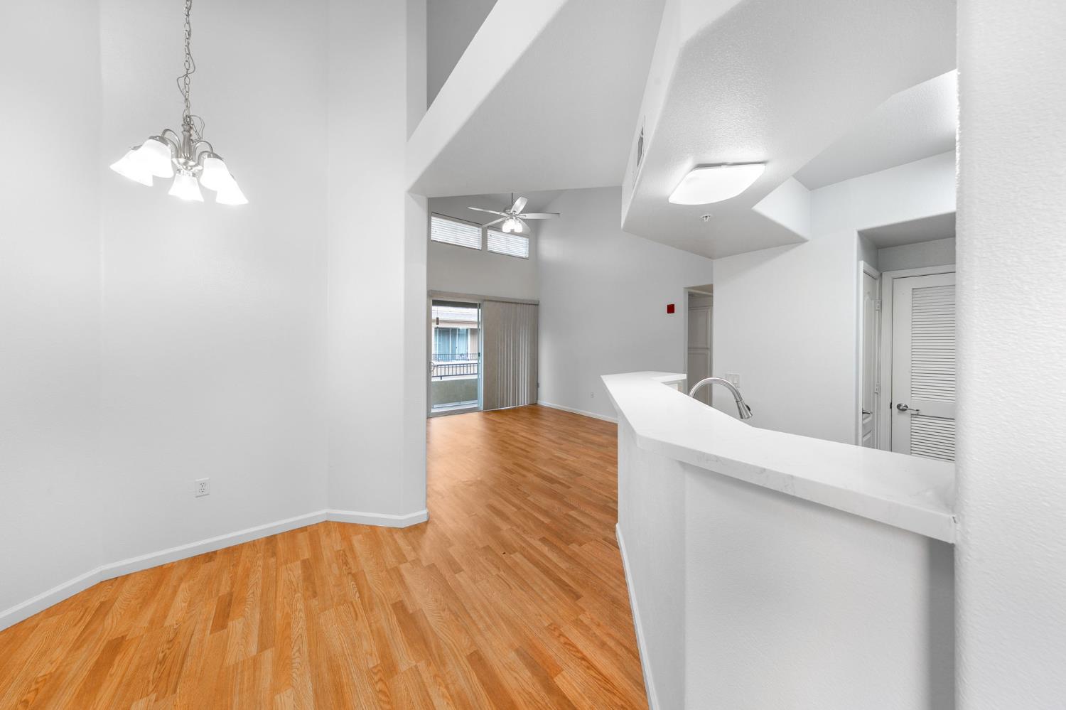 1900 Danbrook Drive, Unit 1222 Sacramento, CA 95835 - Photo 6 of 51 a view of empty room with wooden floor