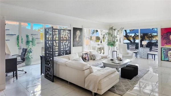 a living room with furniture and a window