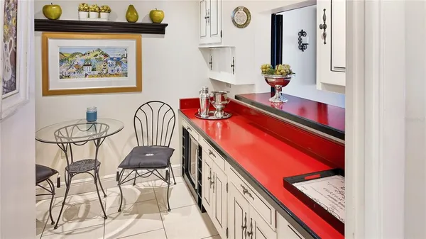 a view of a hallway with furniture and staircase