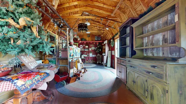 a front view of a house with basket ball court and outdoor seating