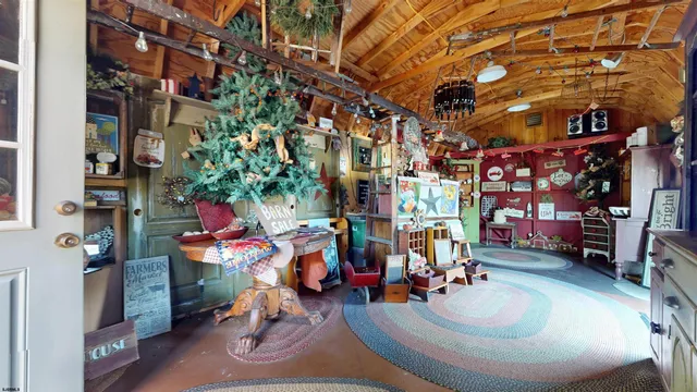 a view of a house with brick walls and potted plants