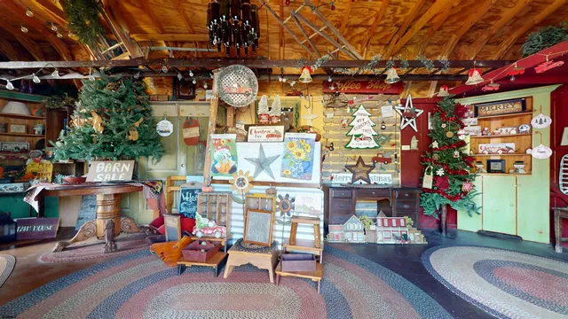 a view of a house with backyard porch and sitting area