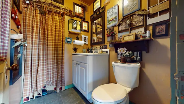 a living room with lots of furniture and a clock
