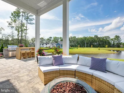 an aerial view of a houses with a yard