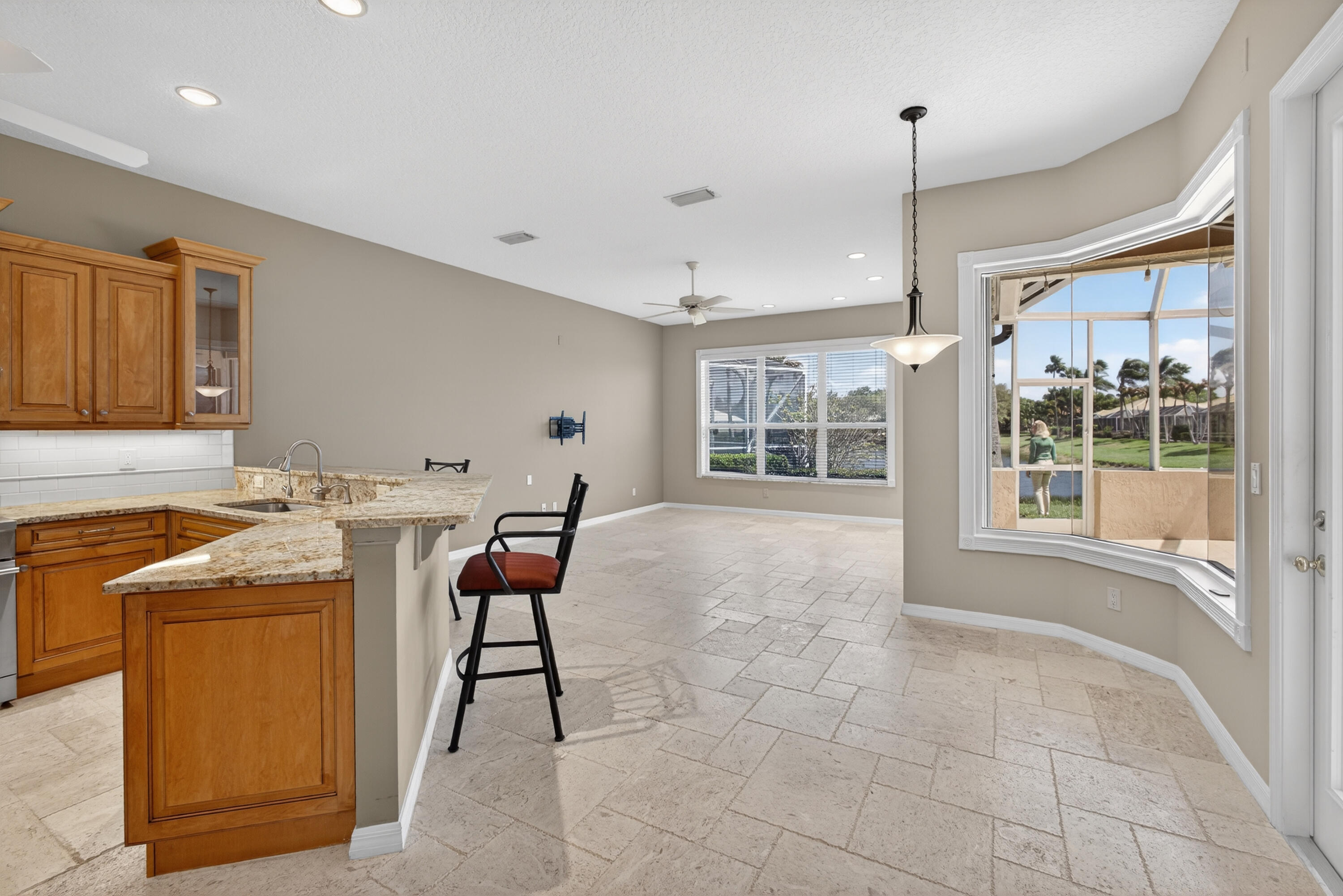 2199 Southwest Brookhaven Way Palm City, FL 34990 - Photo 31 of 119 a living room with a sink furniture and a window