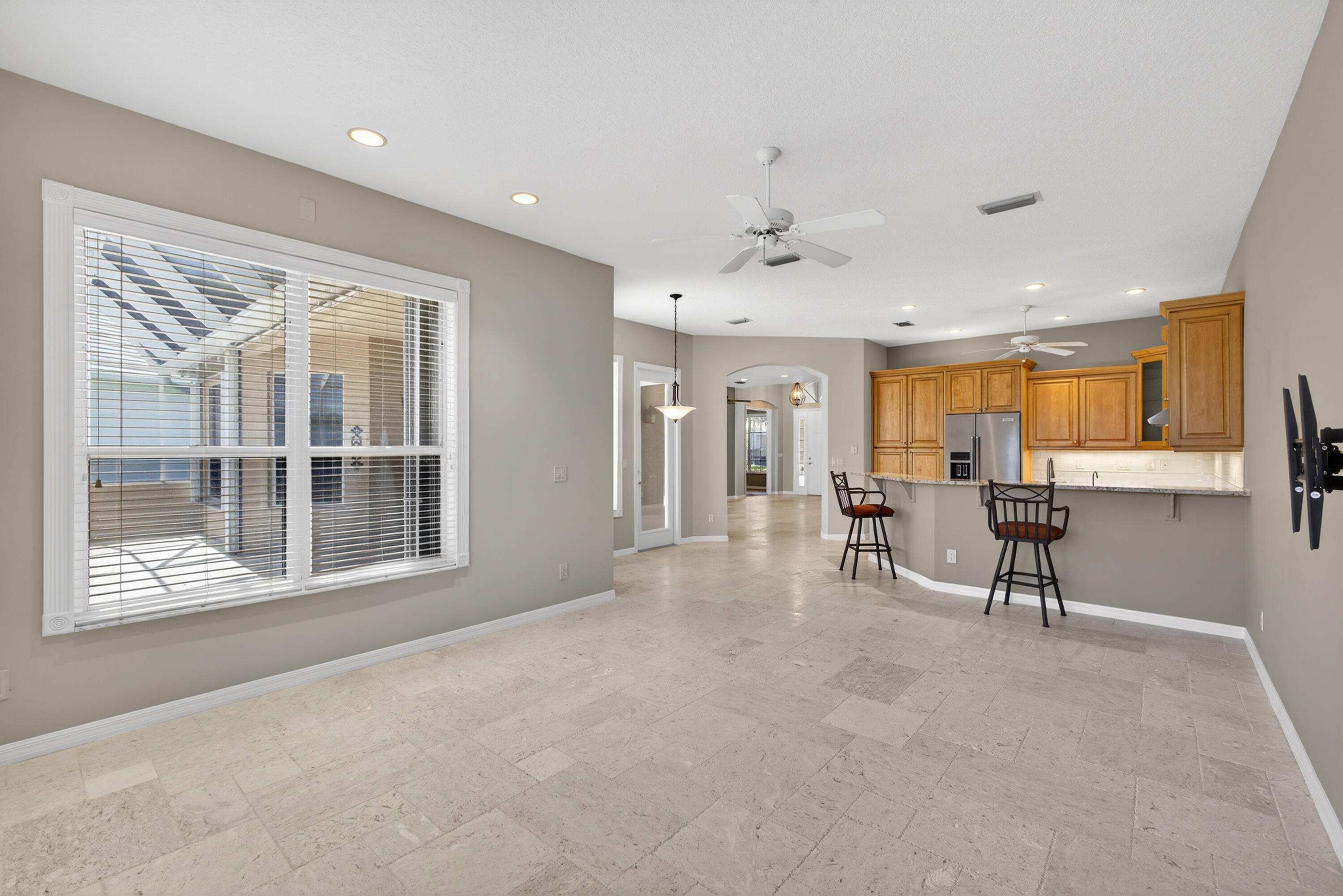 2199 Southwest Brookhaven Way Palm City, FL 34990 - Photo 35 of 119 a view of an empty room with a window